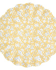 Yellow scalloped placemat with white and blue floral design, Bungalow Furniture & Accessories, perfect for dining settings.