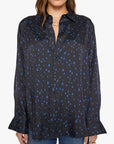 Black long-sleeve cotton button-up shirt with a blue star print by Mother, style The Bestie.