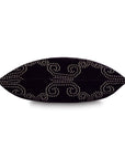 The Elton Onyx Pillow by Eastern Accents is a 22x22 black velvet pillow with a trellis design of swirling metallic studs on woven metallic fabric, shown from the side.