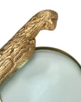 Norine magnifying glass with a textured gold-tone bird-shaped handle from Bungalow Furniture & Accessories.