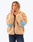 Tan sherpa fleece jacket by Kerri Rosenthal featuring a high collar and Imperfect Heart elbow patches.