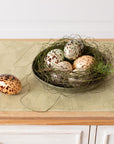 Set of 8 capiz speckled eggs, five in a nest and one beside, by Faire for Bungalow Furniture & Accessories.