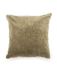 The Velvet Pillow W/ Poms by Sugarboo Designs features a square olive green velvet cover with decorative pom trim, displayed against a white background—ideal for mixing with other colorful throw pillows.