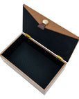Harriett Box, a rectangular wood grain storage box with an open lid, black felt lining, and gold button clasp.