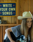 Cowboy-inspired decor with rustic wood accents in a cozy music room, Bungalow Furniture & Accessories style.