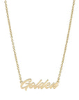 The Faire Script Necklace is a 14K gold, handmade piece featuring a cursive "Golden" pendant attached at both ends to the chain, photographed on a plain white background.
