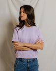 Perfectwhitetee Kennedy SS Crew Sweatshirt in soft cotton, paired with blue jeans, relaxed look against neutral backdrop.