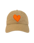 The Kerri Rosenthal Baseball Hat Heart Patch is a tan cap featuring a large orange heart embroidered on the front, inspired by popular styles.