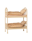 Maileg mouse bunk bed in wheat with floral bedding, pillows, and striped mattresses.