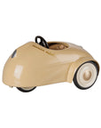 Maileg mouse pull-along car in wheat with black steering wheel and cream wheels.
