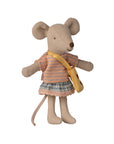 The Maileg Little Sister Mouse W/ Bag by Maileg stands upright against a white background, dressed in a striped shirt, plaid skirt, and carrying a yellow cheese bag.