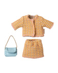 The Maileg Mum Suit by Maileg is a three-piece set featuring a pink and yellow woven jacket, matching skirt, and a small light blue mouse lady bag with a gold chain strap.