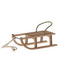 Maileg wooden mouse sled with metal handle and pull rope.