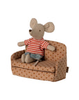 The Maileg Sofa Bed by Maileg adds charm to any SuitCasa living room, featuring a brown polka-dotted foldable design perfect for displaying your favorite plush toys.