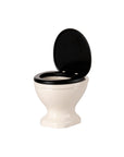 Off-white Maileg mouse WC with black seat and lid, open, displayed against a plain white background.