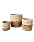 Mkongo plant baskets in beige and brown by Three Faire, handmade in assorted sizes, rustic accent for home décor.