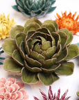 Moss Green Botanicals ceramic flower with layered petals in a rosette shape by Bungalow Furniture & Accessories.