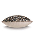 The Bagira Spot with Small Welt by Eastern Accents is a rectangular leopard accent pillow featuring a bold animal print on top, solid beige fabric underneath, and elegant welt detail—a chic neutral for any space.