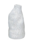 The Creative Co-op Organic Shaped Vase is a textured white stoneware piece with an uneven, organic form, a narrow tilted opening, and a subtle reactive glaze finish.
