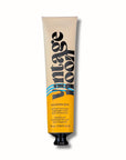 The beige and yellow 75ml tube of Vaca Skin Redness Recovery by Faire is an overnight mask and moisturizer for sensitive skin, featuring black text and a black cap. It hydrates and soothes redness for a healthy glow.
