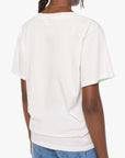 White Supima tee by Mother, The Varsity Rowdy style, shown from the back with blue jeans on a white background.