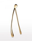 The Faire Wishbone /Large is a gold-colored decor piece that stands upright on a plain white background, making a unique handcrafted gift or elegant home accent.