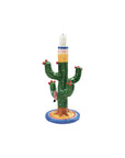 Hand-painted ceramic cactus taper holder with red floral accents on a blue base by Creative Co-op.