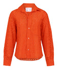 The Daily Shirt by Cissa is a bright orange long-sleeve crop shirt in airy paper cotton eyelet lace, with a collar, chest pocket, and all-over cut-out floral pattern—perfect for standing out every day.