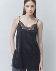 Black satin top with lace trim by SUNCOO, Lune Shirt, shown facing forward against a light background.
