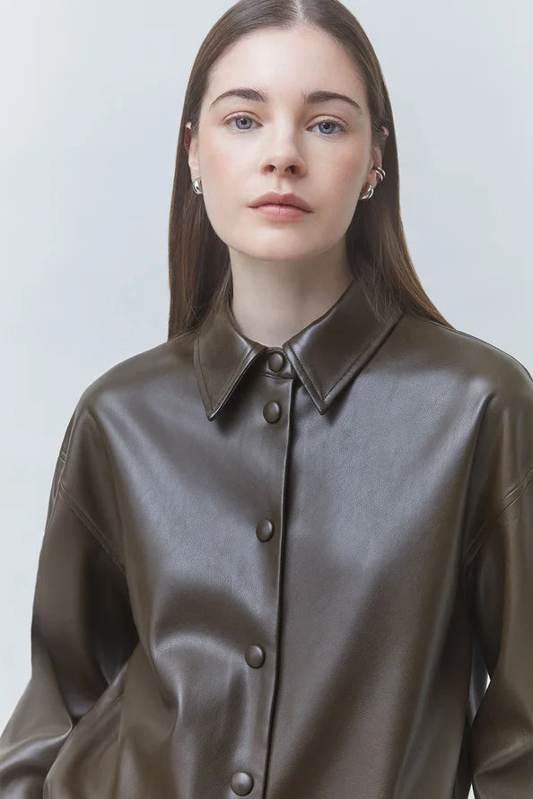 SUNCOO LENNOX kaki jacket with straight brown hair model, styled in a minimal, light-toned setting.