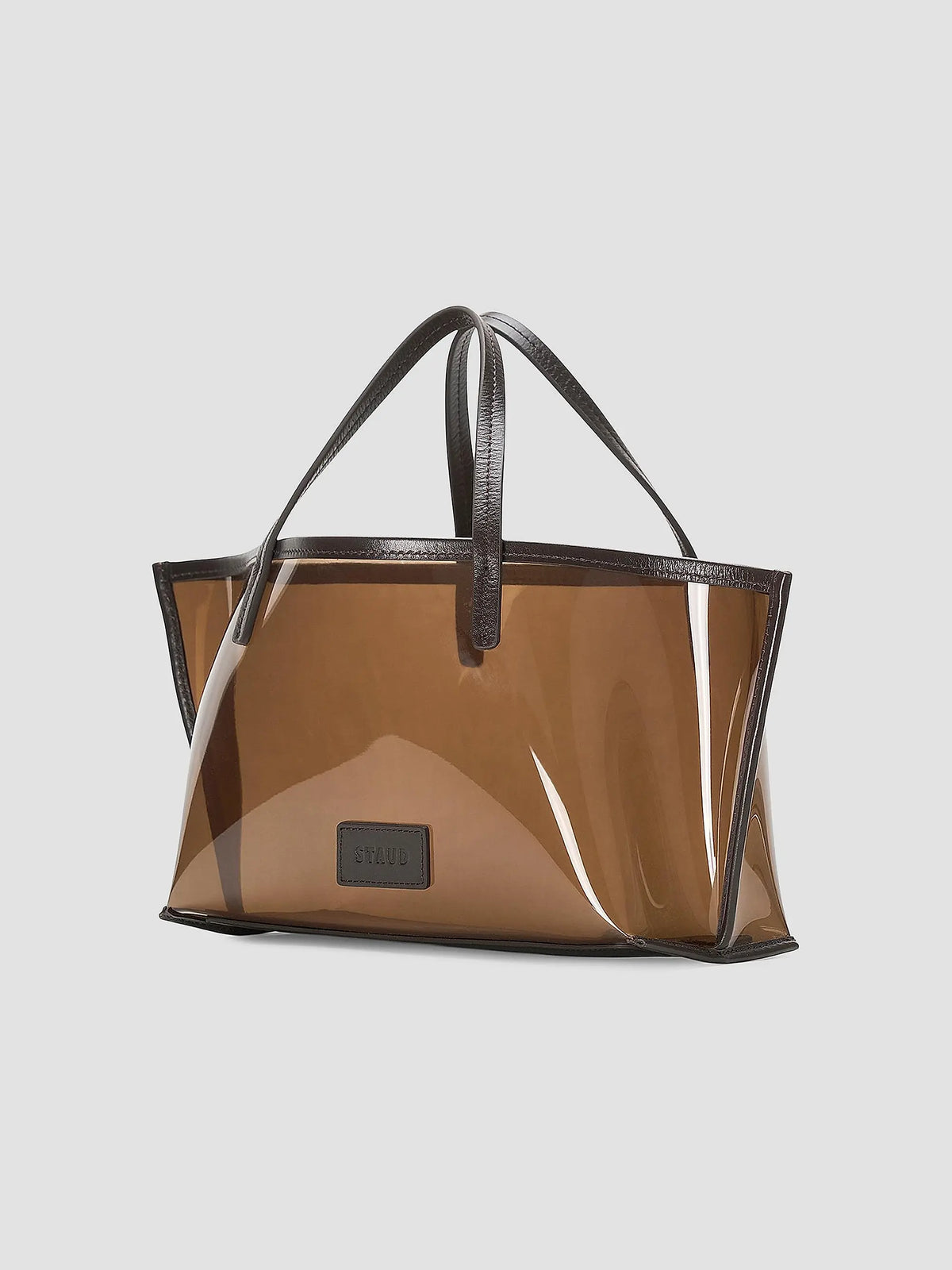 Brown transparent mini tote with black handles and trim, Staud Christos in Espresso.