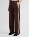 Brown wide-leg rb miramar terry track pull-on jeans with light side stripes and button detail.