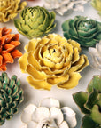 The Buttercup Yellow Peony by Faire features intricately crafted ceramic petals in a vibrant yellow hue, mimicking real succulents to create striking handmade home decor.