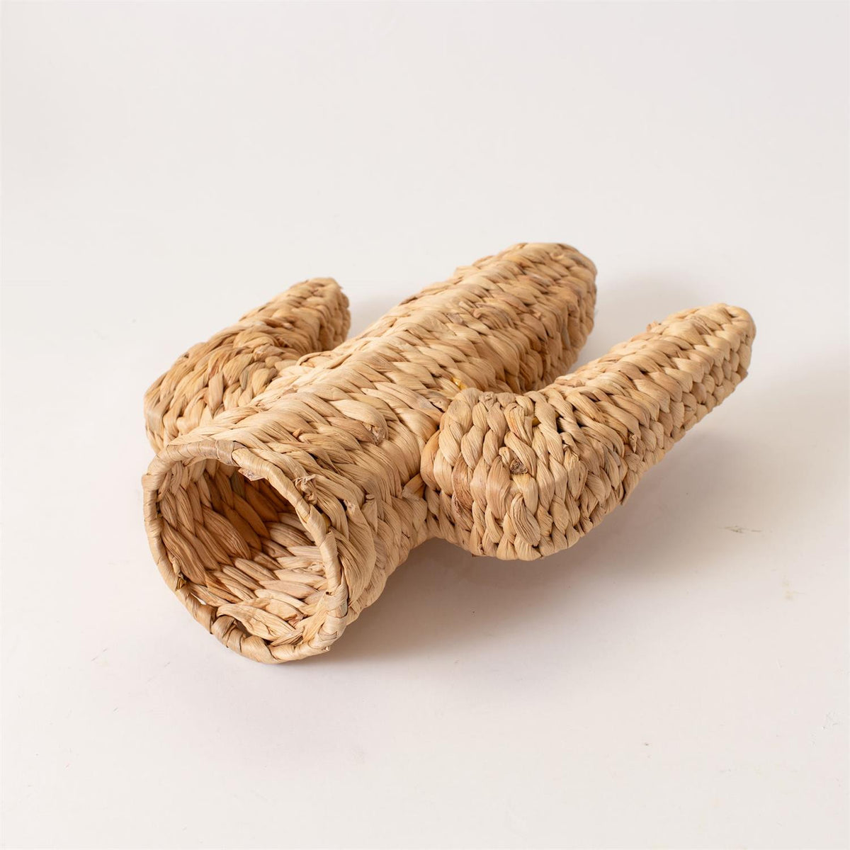 The Faire Cactus Figure Woven S is a playful straw cat tunnel shaped like a cactus, with one large opening and two smaller side extensions, displayed on a plain white background—perfect for your feline friend.