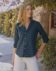 Barry Tailored Button Up Shirt by Frank & Eileen in white, styled outdoors against lush greenery.