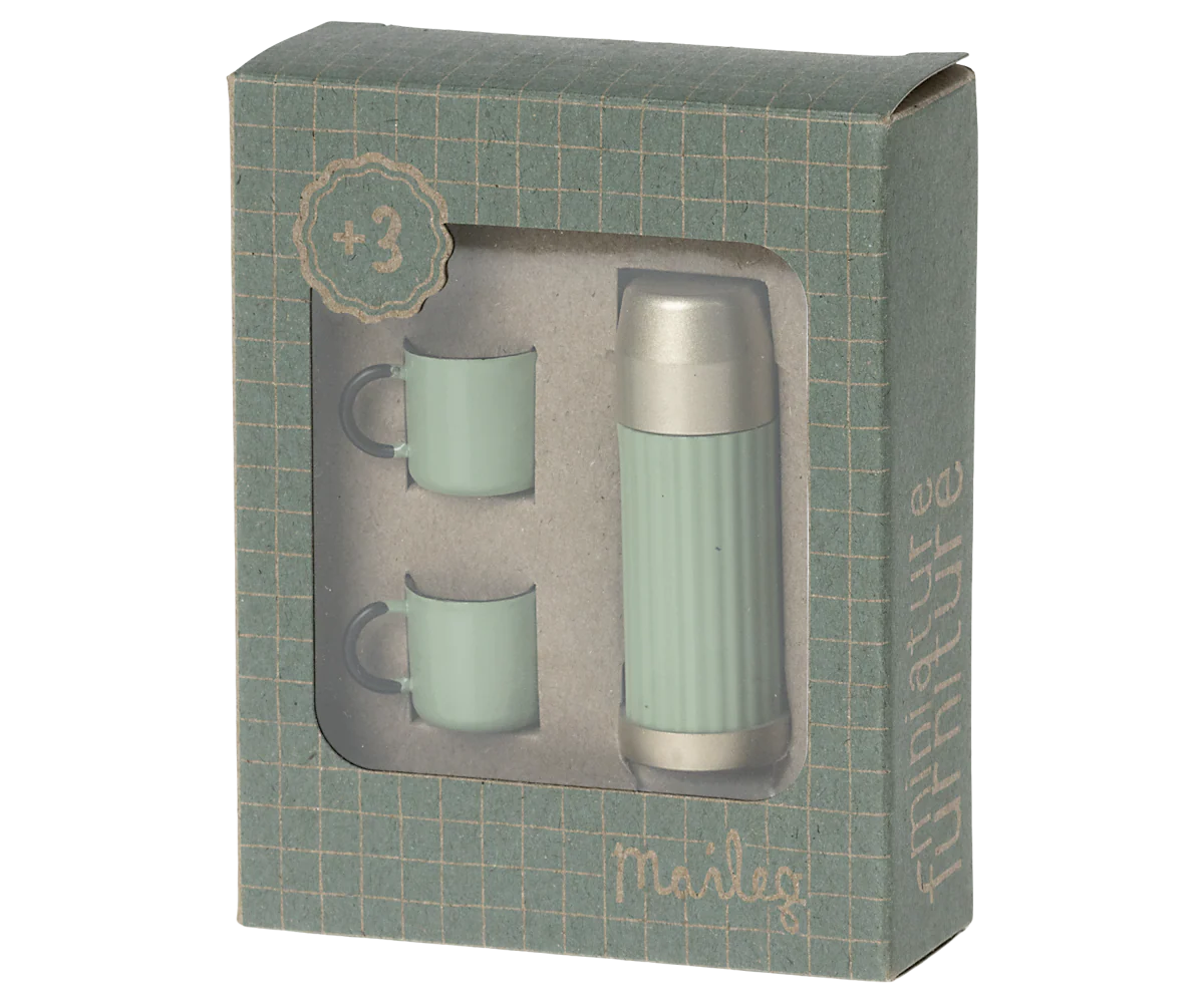Light blue and silver Maileg Thermos & Cups set in a green grid box with clear window, for hiker mice.
