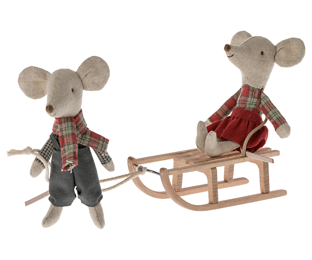 Maileg Mouse sled set featuring two fabric mice, one pulling the other on a small wooden sled.