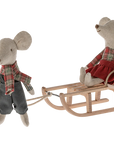 Maileg Mouse sled set featuring two fabric mice, one pulling the other on a small wooden sled.