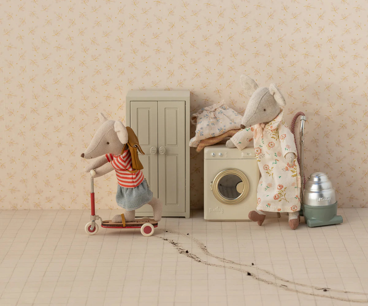 Maileg Closet with dollhouse furniture in a warm, playful kids’ room as mice play nearby.