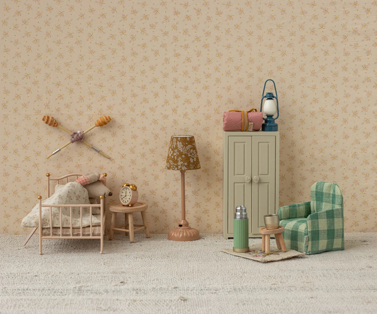 Maileg mini alarm clock on bedroom nightstand in Mouse Hole Farmhouse, perfect accent for dollhouse or playroom décor.