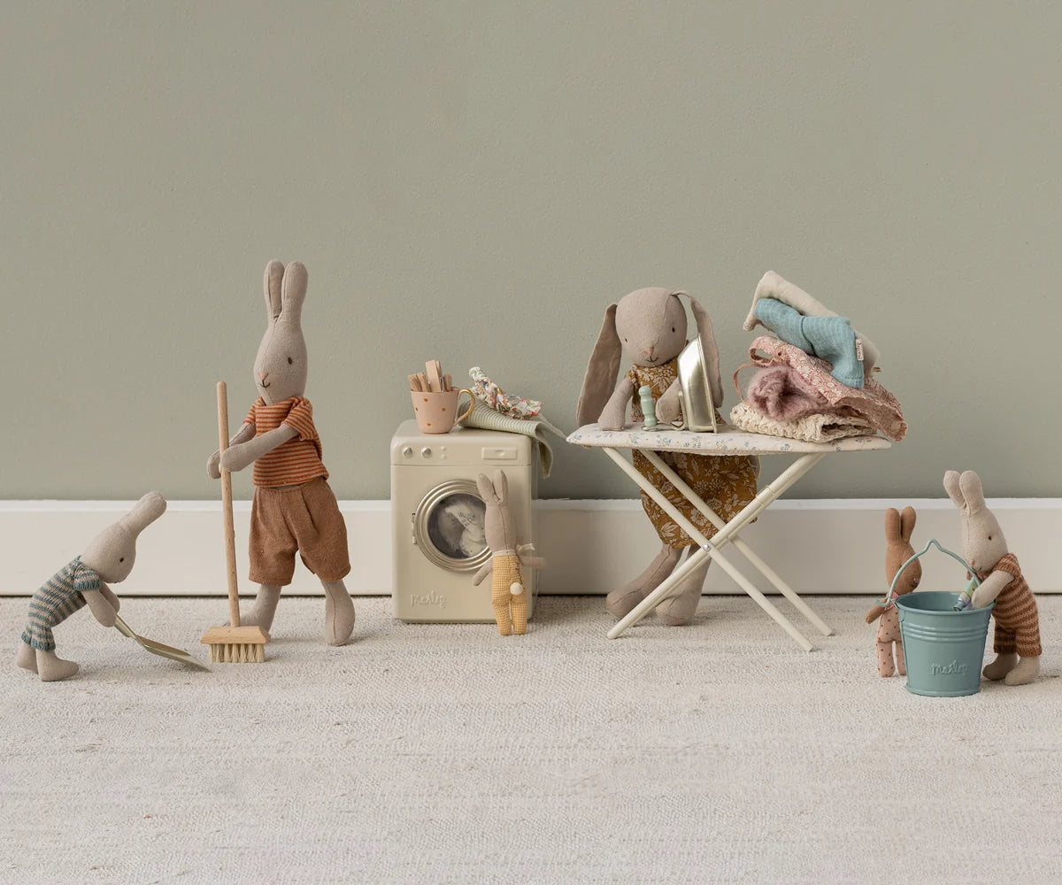 Maileg Broom Set in play, with stuffed rabbits sweeping in a cozy miniature home scene.