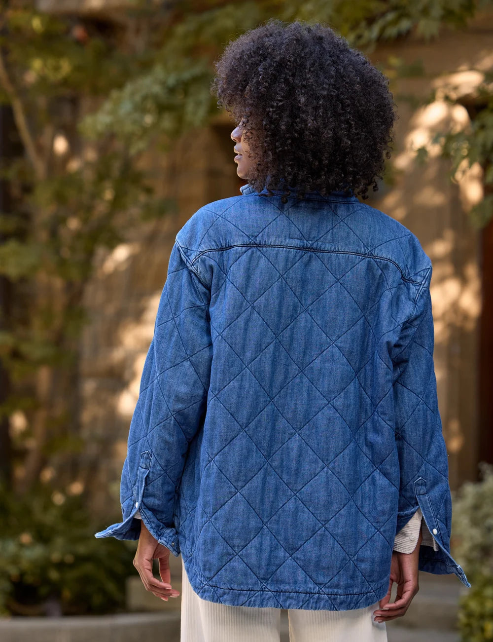 Diamond-quilted Eileen Denim Jacket in Famous Denim, back view.