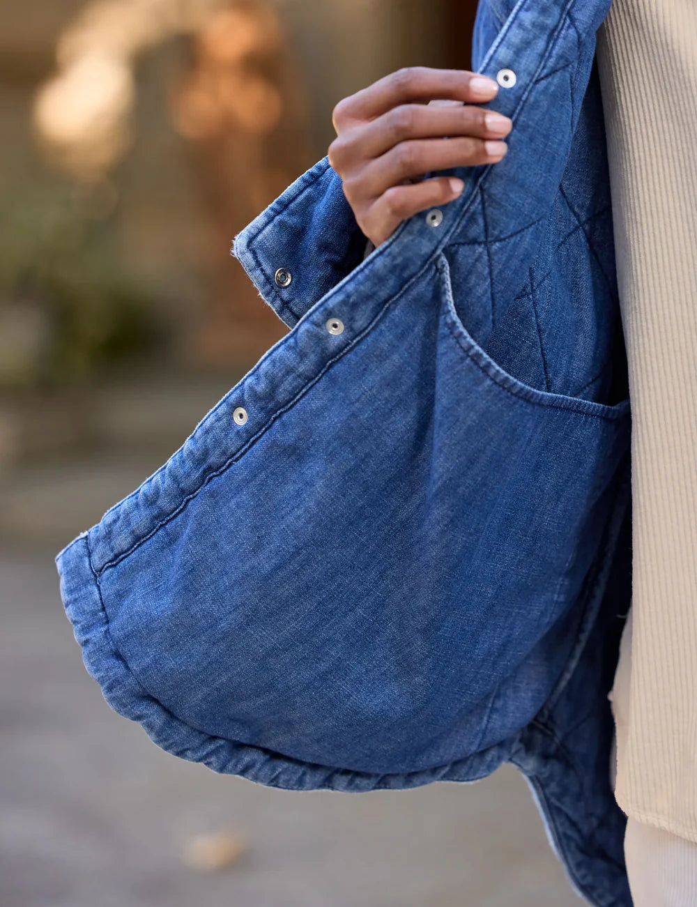 Quilted Eileen Denim Jacket in blue with diamond pattern, snap closures, and interior pocket from Bungalow.