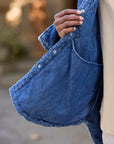Quilted Eileen Denim Jacket in blue with diamond pattern, snap closures, and interior pocket from Bungalow.