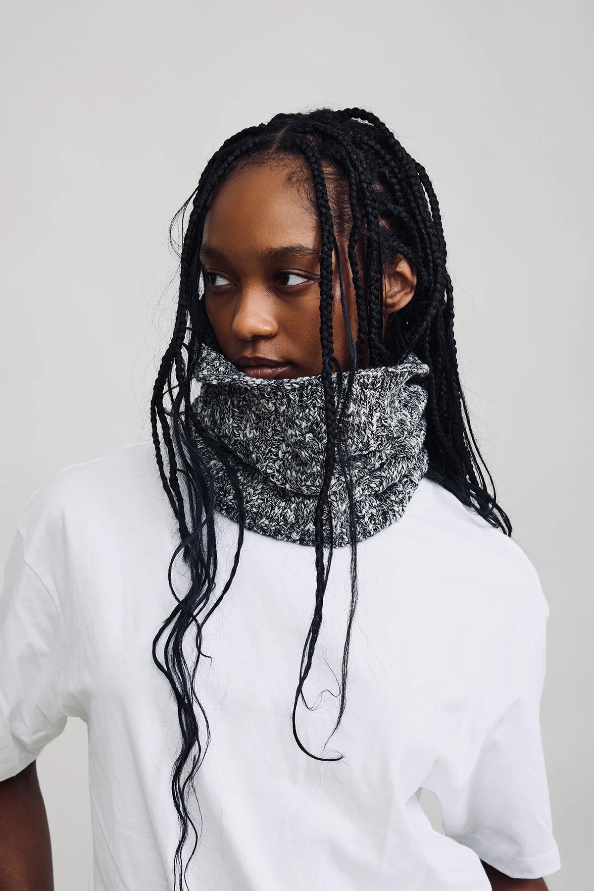 Denimist CLASSIC SNOOD in soft knit worn with a white cotton blend shirt, styled on a model with long braids.
