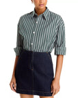 Cissa Mr Big Shirt in hunter stripe with adjustable cuffs, paired with a dark denim skirt from Bungalow Furniture.