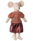 The Maileg Skirt & Knitted Blouse doll by Maileg features a fabric mouse with large pink ears, a stitched nose, and dressed in a knitted blouse and shiny pink skirt, standing upright against a white background.