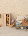 Maileg Dad Mouse in striped pants and shirt adds cozy charm to a playroom scene with bed, wardrobe, and accessories.