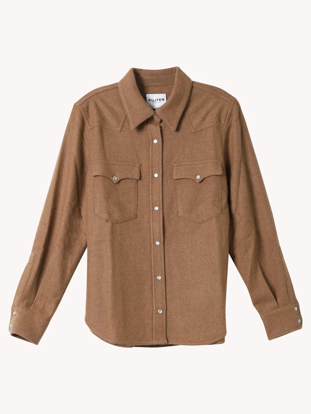 The KUJTEN Lumber L/S Shirt is a brown long-sleeve button-up with two front chest pockets, snap buttons, and a pointed collar, offering a structured look ideal for layering over women's sweaters or cashmere. Shown on a plain light background.