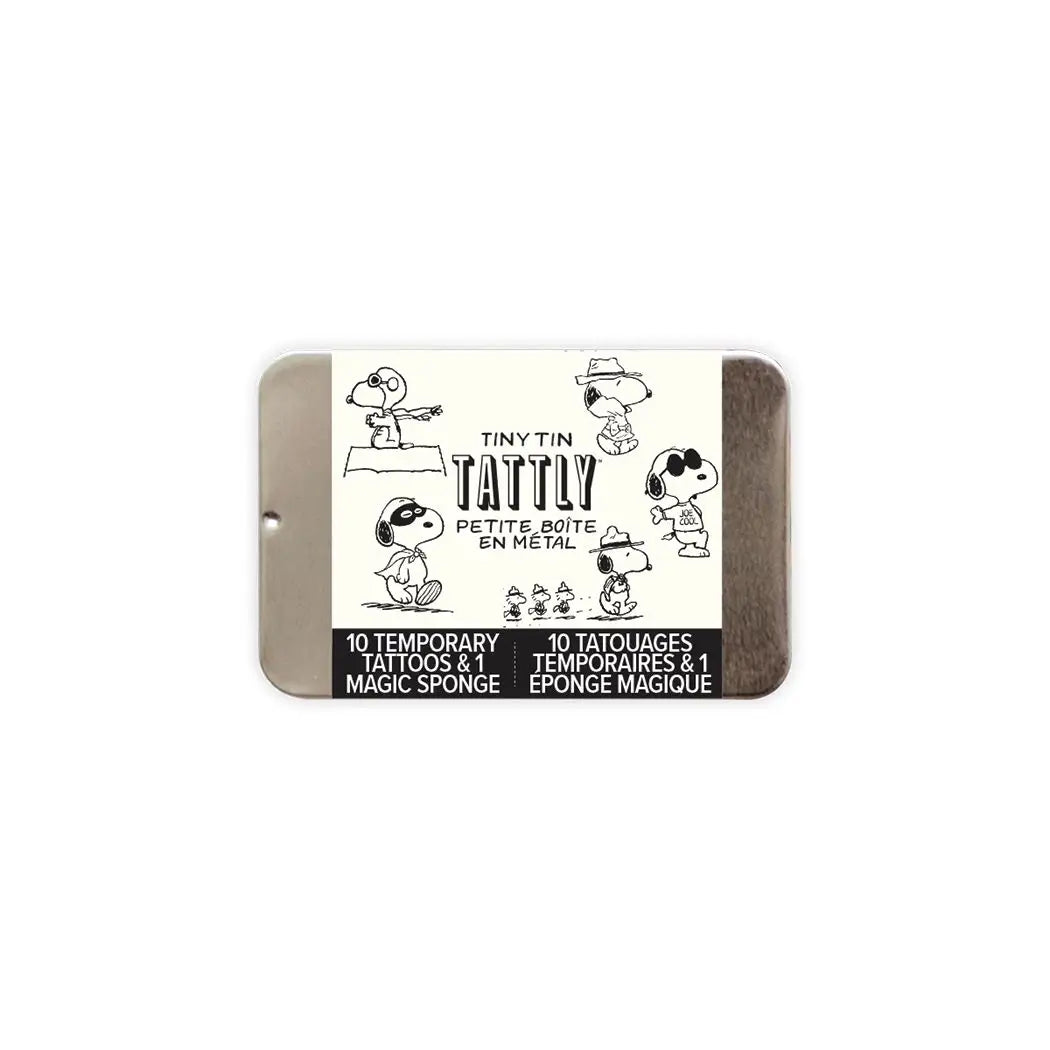 The Tattly Tattoo Tin by Faire is an illustrated tin with playful cartoon characters. The label says "Tiny Tin Tattly Petite Boîte en Métal," featuring "10 Tattly Temporary Tattoos & 1 Magic Sponge" in English and French. Enjoy vibrant, non-toxic designs perfect for safe creative expression.